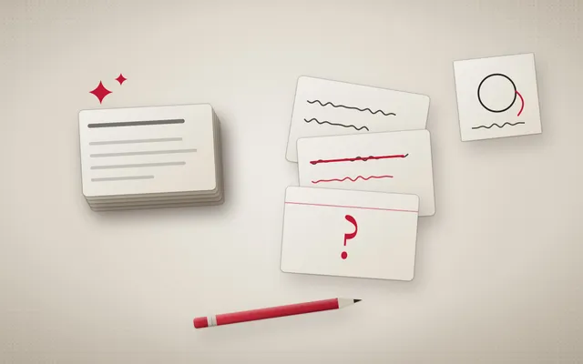 Illustration of two piles of flashcards: a neat printed deck on one side and handwritten cards with crossings-out and doodled examples on the other, with a pen between them.
